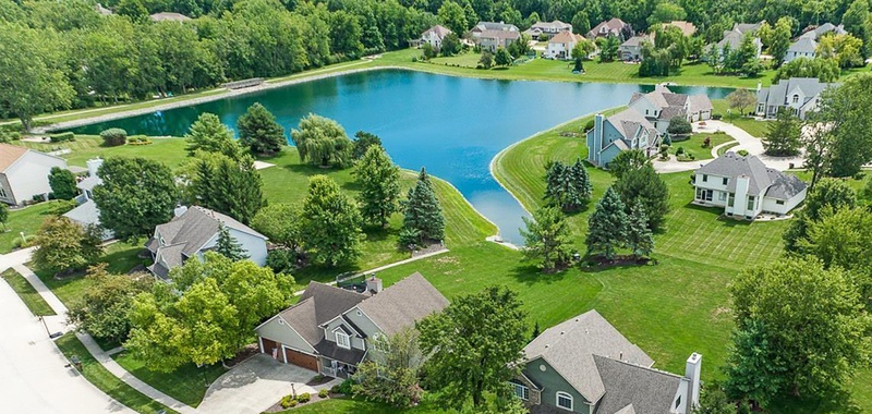 Neighborhood view with a lake